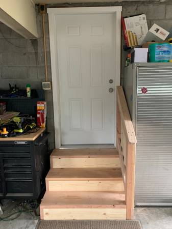 Kitchen remodel with cabinets, flooring, and appliances installed
